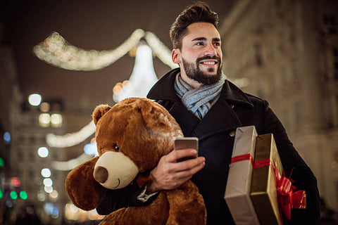 man with gifts for his partner supposedly