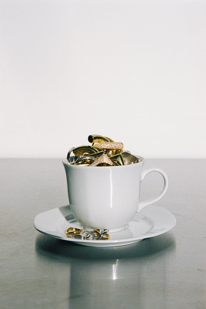 Cup of jewellery 