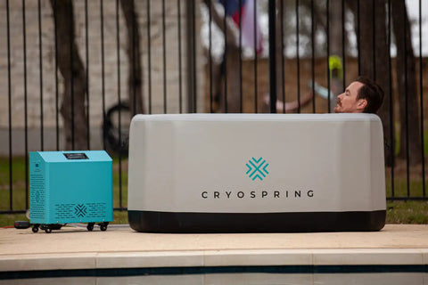 Man having a cold plunge on Cryospring Cold + Hot Plunge System