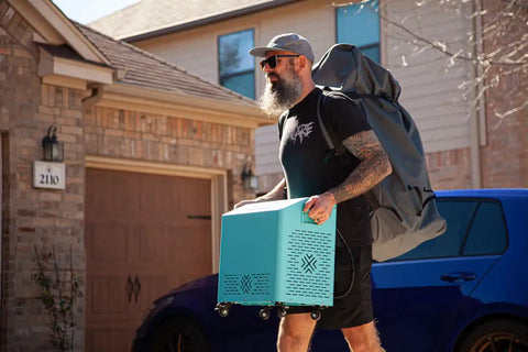 Man holding Cryospring Wi-Fi Enabled Smart Chiller