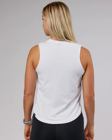 Model wears LSKD white rep tank. Image shoes back of tank which is plain white