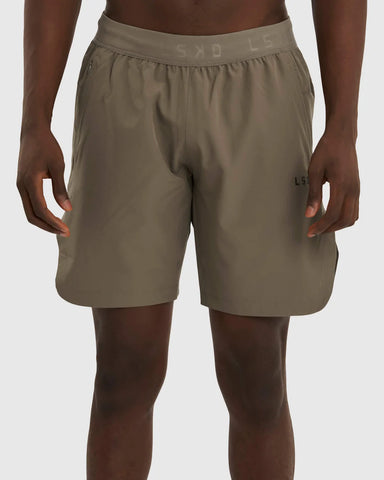 Model wears LSKD brown shorts 