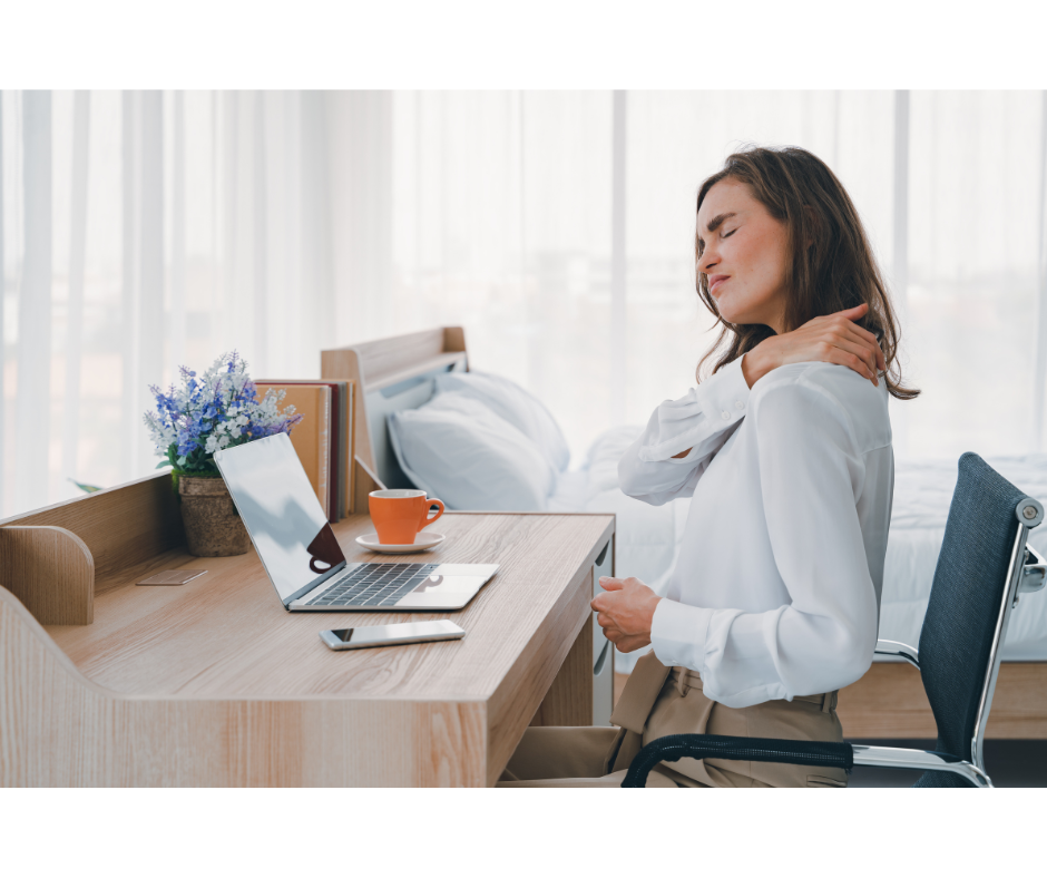 Woman Sitting in an Office Chair massaging her neck