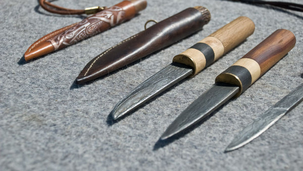 A lineup of pocket knives