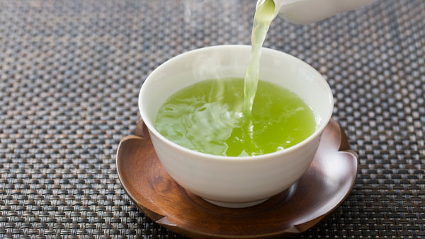 Pouring Green Tea