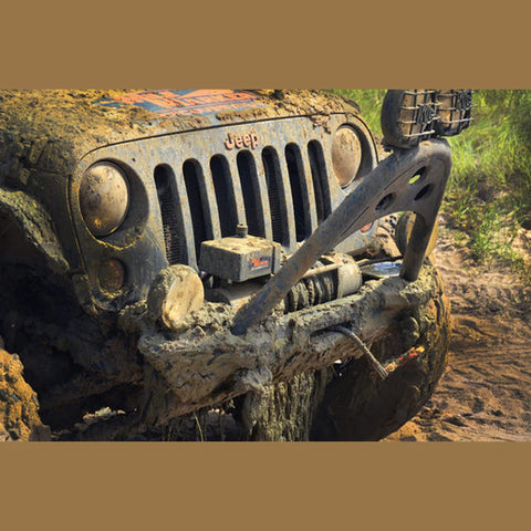 Electric Winch Pulling a Jeep From Mud