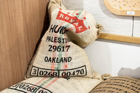 Green coffee beans in jute bag