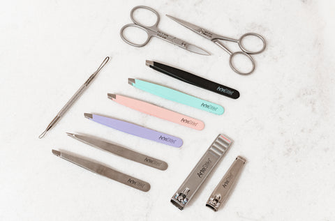 ArteStile beauty tool collection on white table