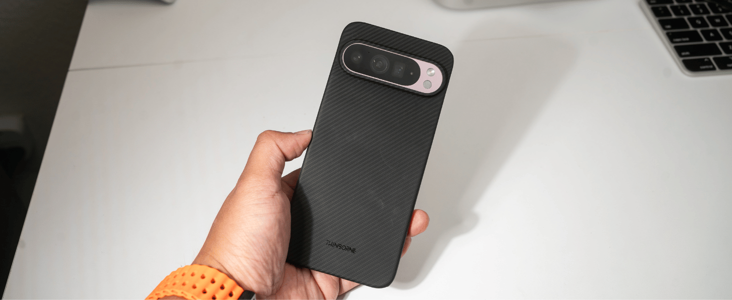 male hand holding the phone inside the aramid fiber pixel 9 pro case