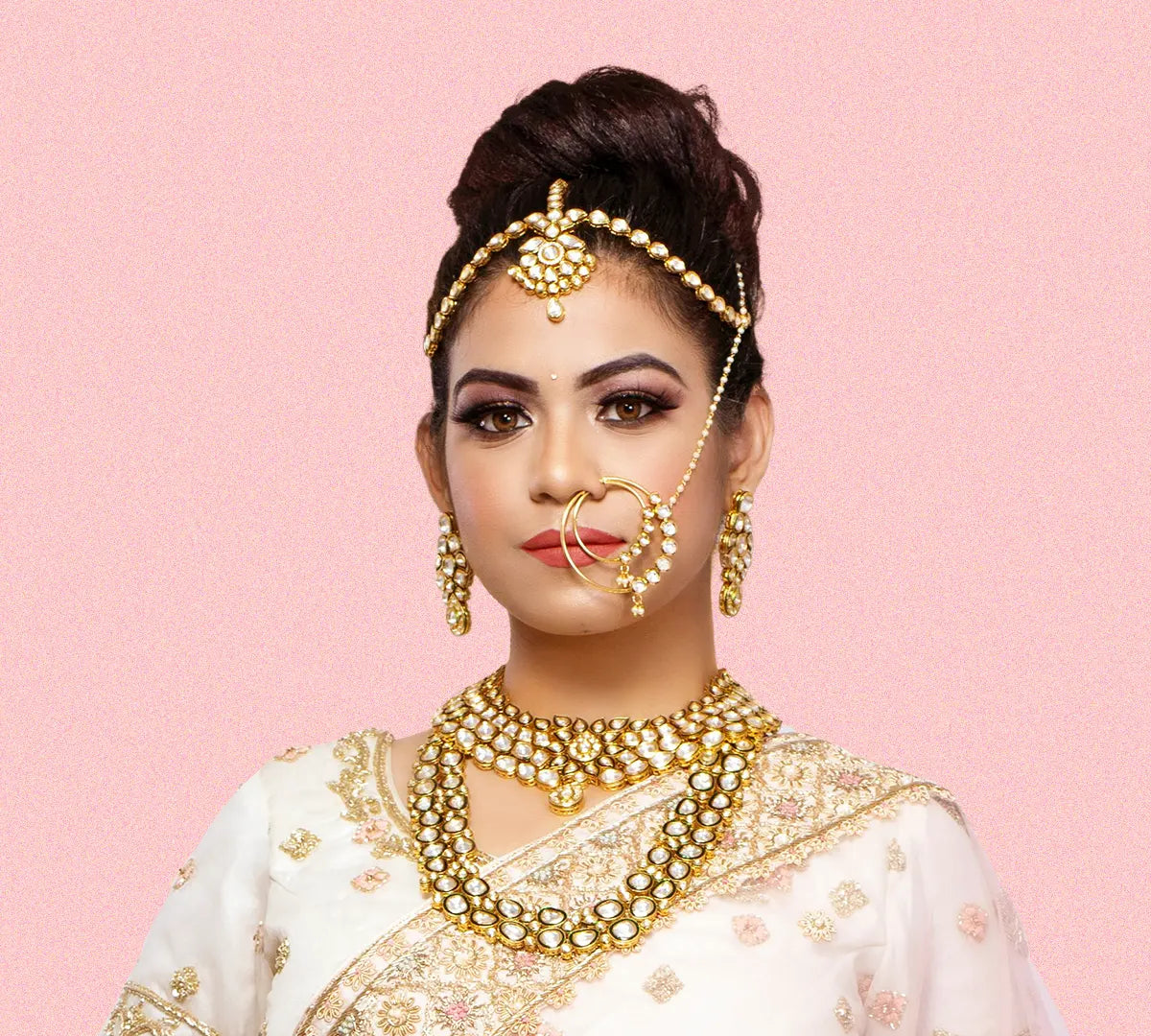 A Woman Wearing Gold Plated Bridal Jewellery Set