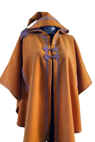 Orange mid length cashmere coat with purple embroidery in Moroccan silham way