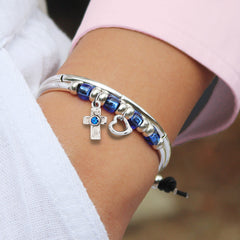 Resa silver adjustable size bracelet shown with charms