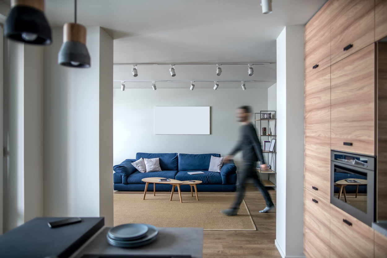 Man walking through home living room