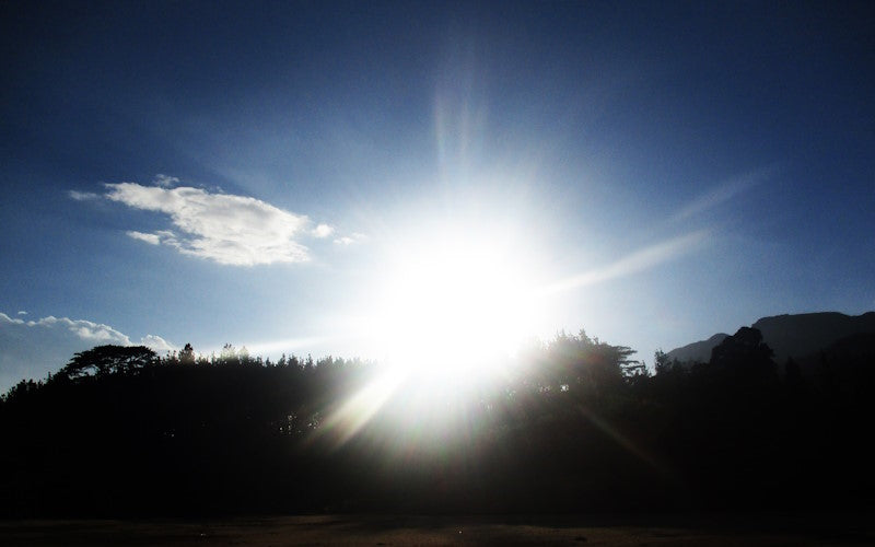 Sunrise breaking over a mountain