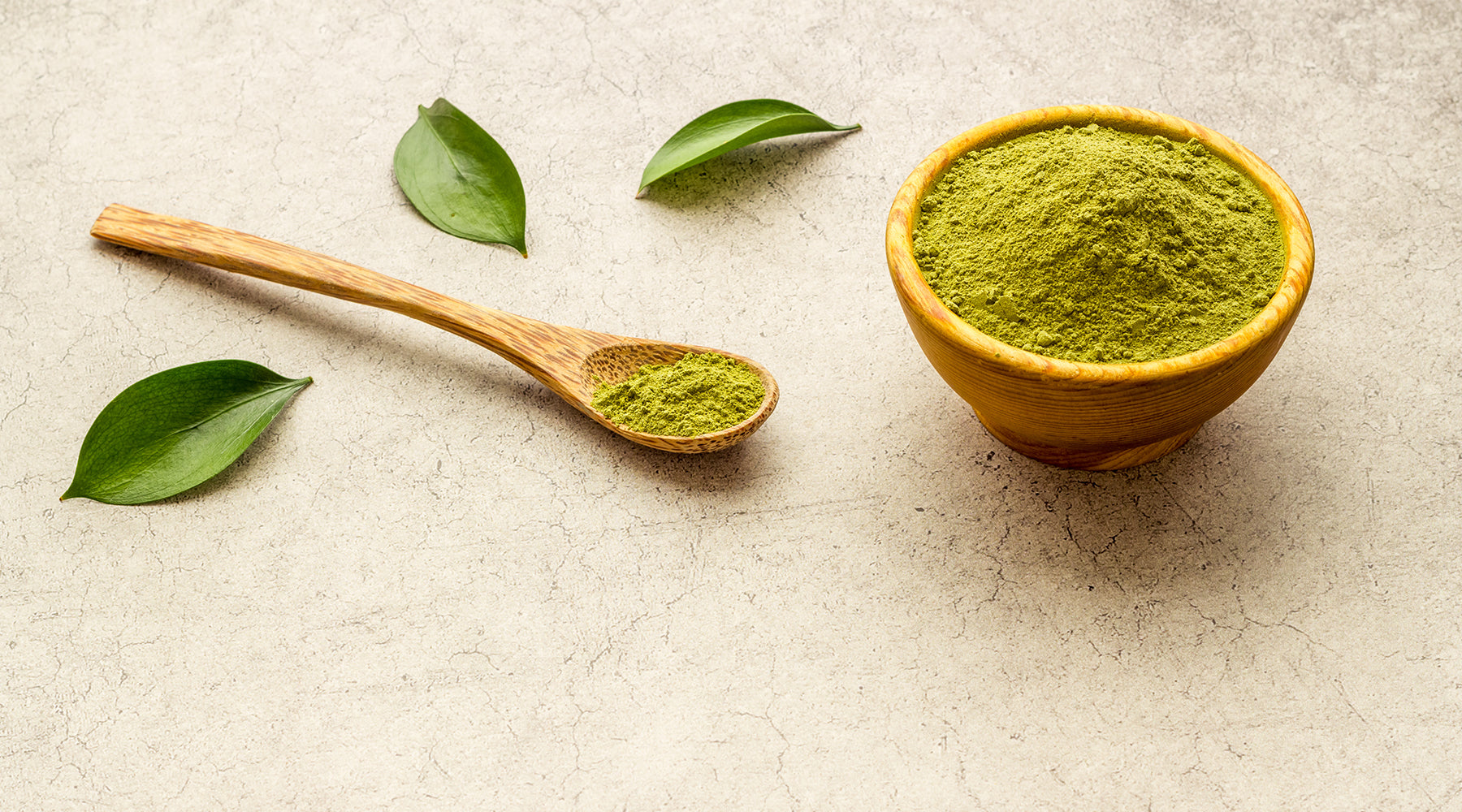 a wooden bowl of henna - a safe hair dye for allergy sufferers