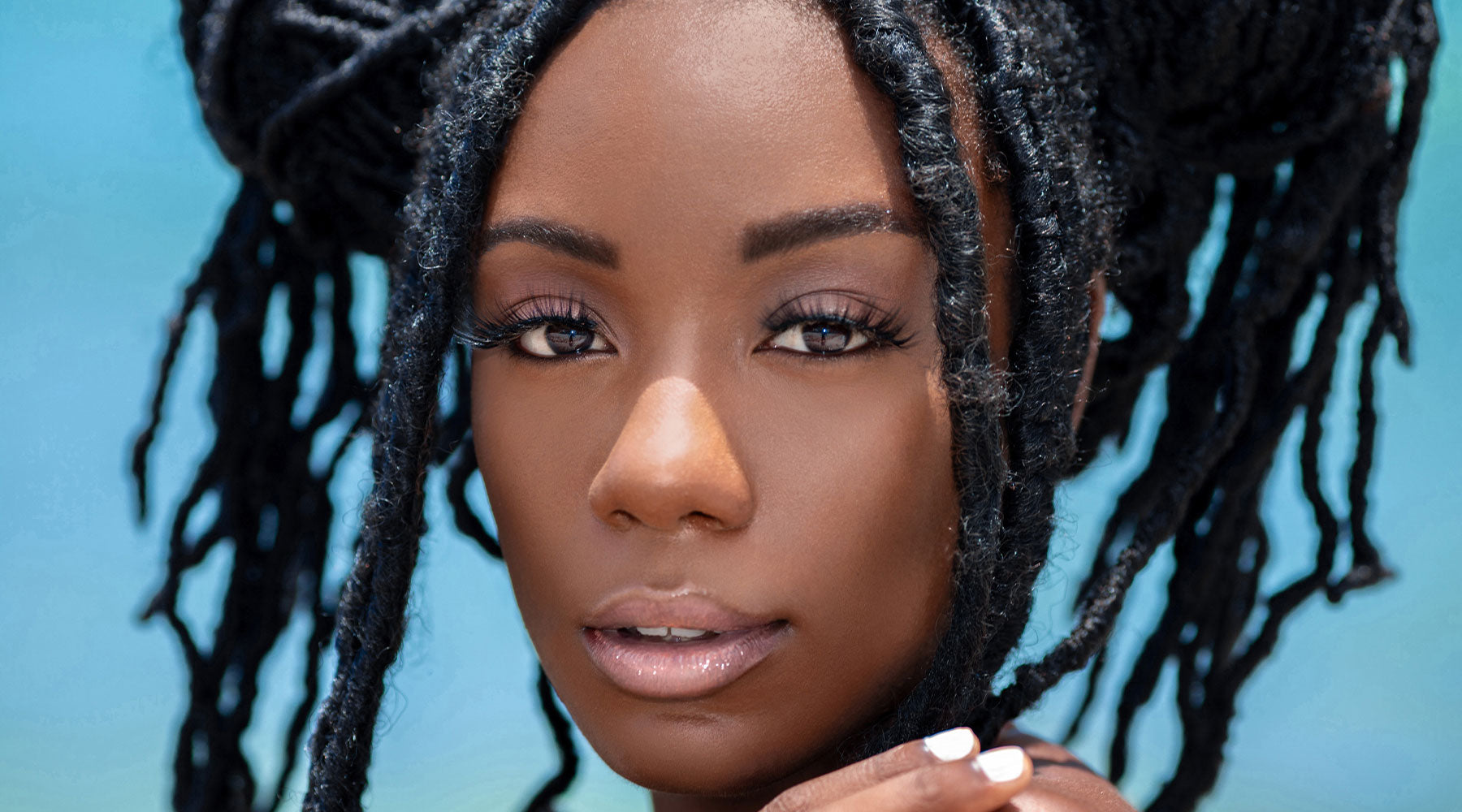 woman thinking about dying dreadlocks with henna