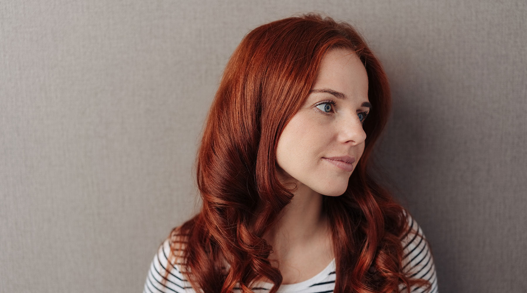 woman wondering how long henna hair dye last