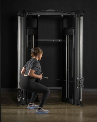 Female doing squat row on Functional Trainer