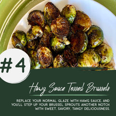 Roasted brussel sprouts, cut in half and charred on one side, tossed in McMasters' Hawg Sauce