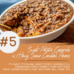 Sweet potato casserole in a white serving dish, topped with Hawg Sauce candied crumbled pecans