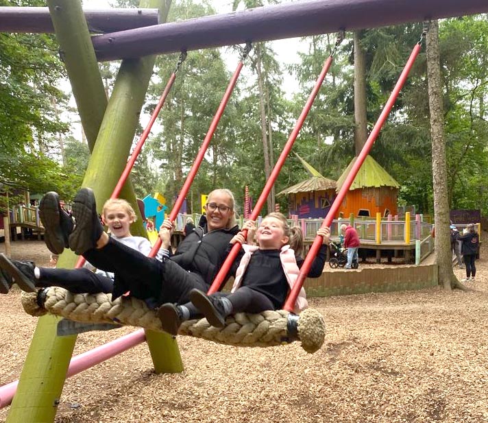 On a swing with my girls