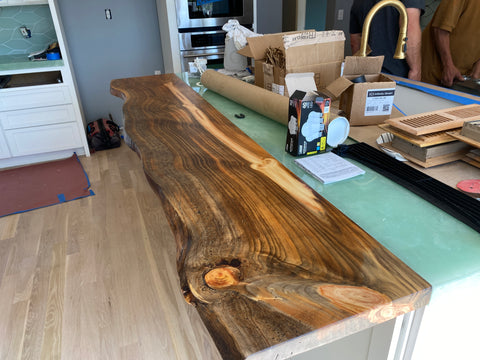 live edge bar top installed in the kitchen