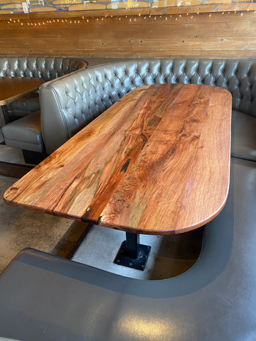 oval dining table for a restaurant and bar