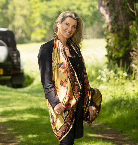 The most luxurious looks, using not one, but TWO large square silk scarves. Take two large square scarves, tie an end of each together, place behind your neck and drape the scarves on either side of your shoulders for your large square double shawl scarf style