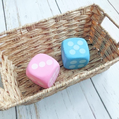 Place foam dice in a basket to create a Tumble Tub