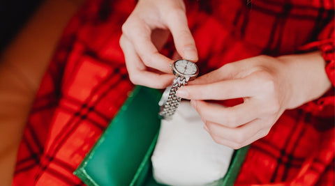 Lady Holding Watch On Christmas Day