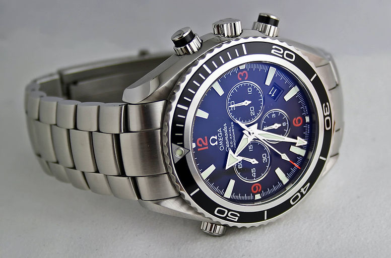 Blue Omega Seamaster with stainless steel watch strap