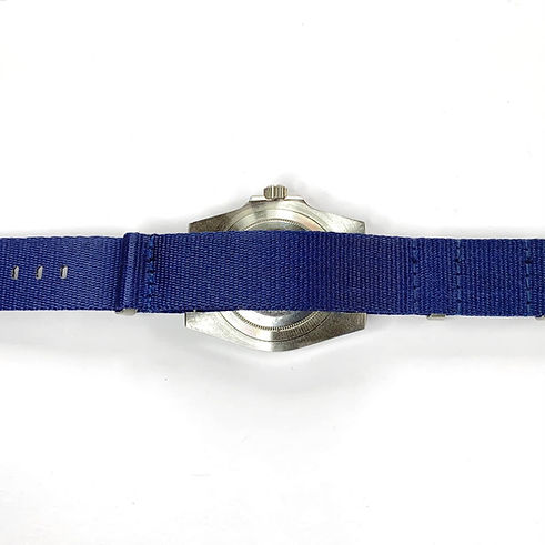 Feed the long end of the NATO watch strap through the short end