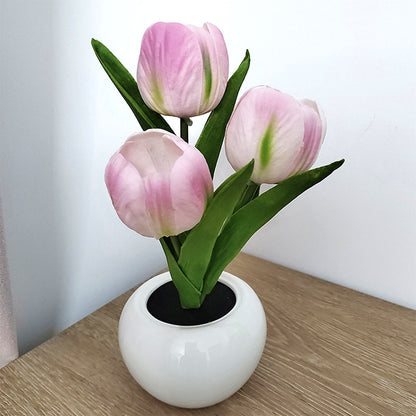 Flowerpot Potted Table Lamp: Bộ đèn bàn và hoa giả trang nhã này sẽ đem đến cho bạn một không gian sống thú vị hơn. Chiếc đèn bàn này sẽ giúp cải thiện không gian sống của bạn và tôn lên vẻ đẹp của cây hoa giả được cắm trong một cái chậu đẹp mắt.