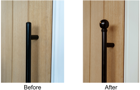 From The Anvil Black pull handle with standard end caps (left) vs. From The Anvil Black pull handle with Hammered Ball curtain finial end caps on a wooden door.
