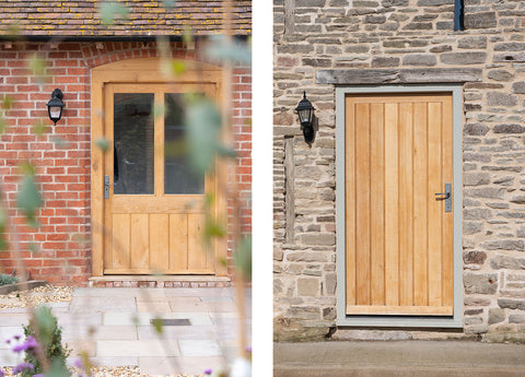 Two oak wood doors on separate buildings, both with Pewter From The Anvil door handles and a black wall light next to them.
