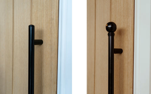 From The Anvil's Black door pull handles on a wooden door (left) and the same handles fitted with Black Hammered Ball curtain finials (right).