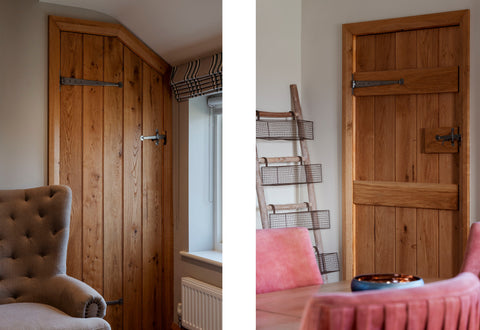 Two images of wooden ledge & brace doors with Pewter T hinges and thumblatches, with arm chairs in the foreground.