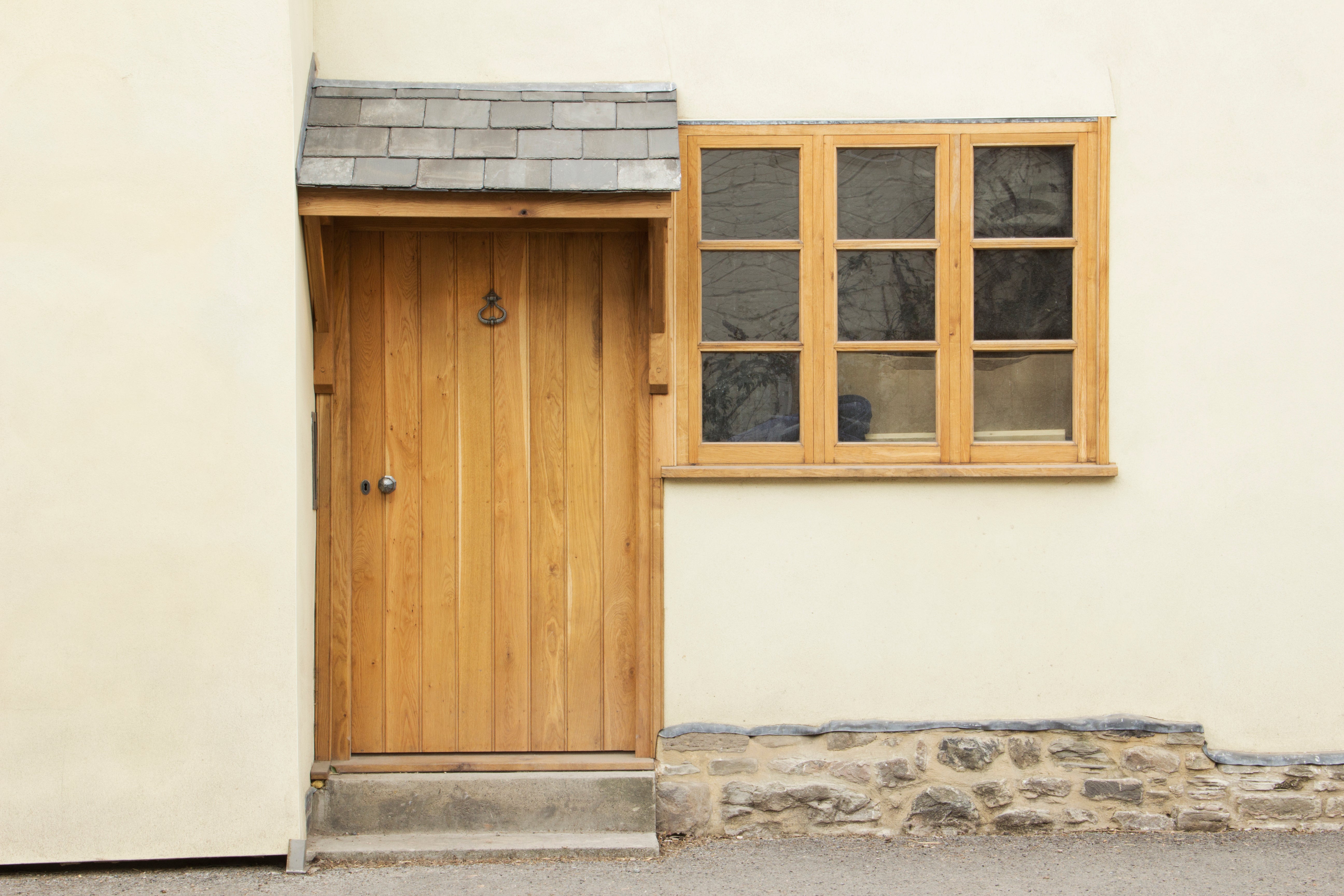 Exterior oak door with an oak box lock fitted to the interior.