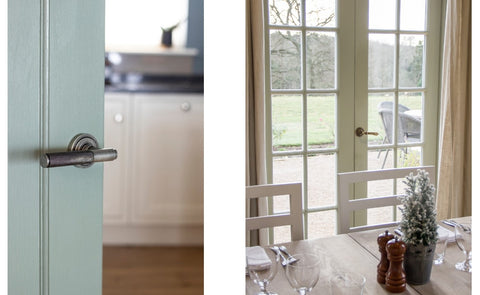 Left: green door with a Pewter From The Anvil knurled door handle. Right: French patio doors with a Brass From The Anvil lever door handle, with a set dining table in the foreground.