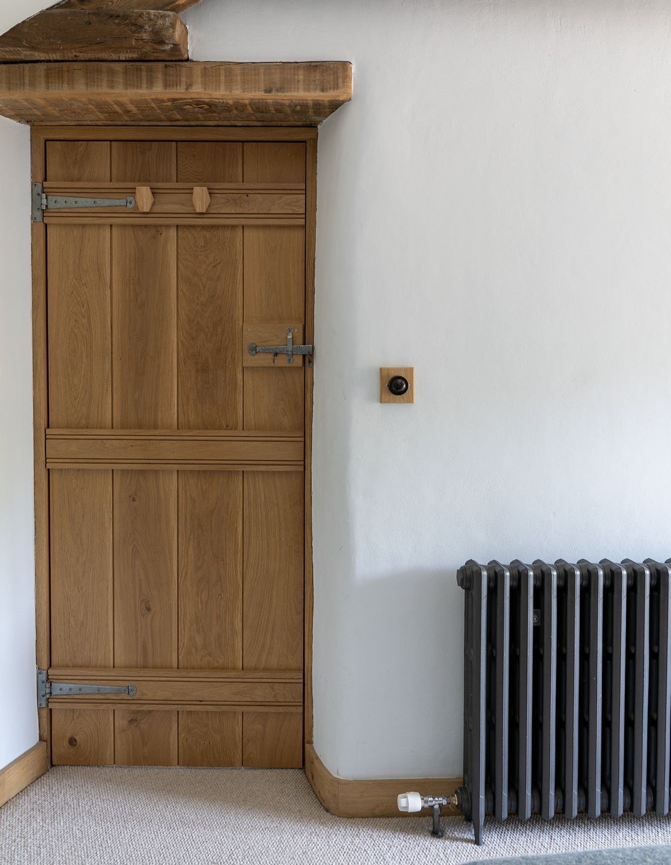 Wooden ledge & brace door fitted with Pewter Penny End T hinges & matching Pewter thumblatch.
