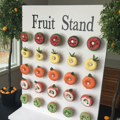 Fruit Display Using White Donut Wall