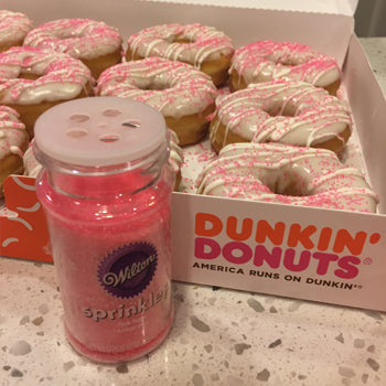 Plain White Glazed Donuts with Drizzled Candy Melts and Sugar Crystals