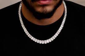 man wear baguette diamond necklace