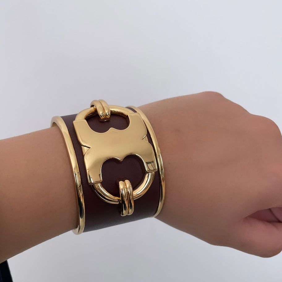 Tory Burch Brown Leather and Gold Logo Cuff Bracelet | Gently Used | |  Secret Stash