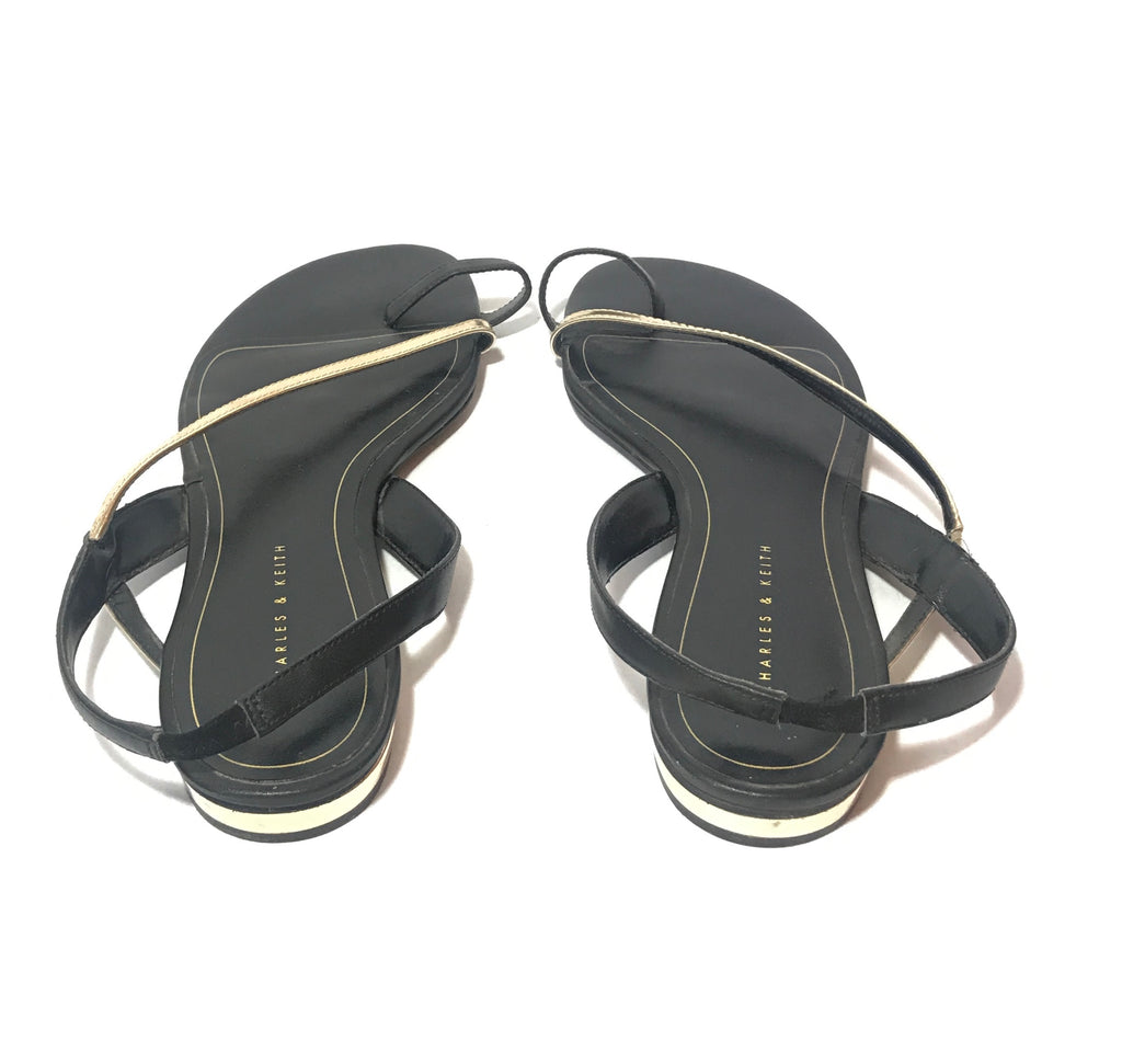 Charles & Keith Black & Gold Toe Strap Sandals | Pre Loved | | Secret Stash