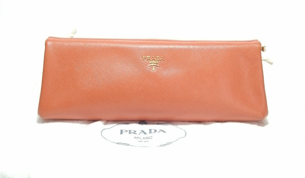 prada orange clutch