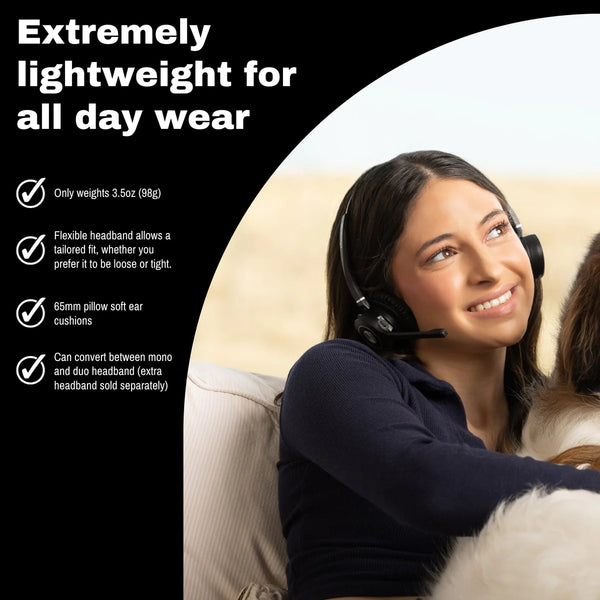 woman sitting holding a dog while wearing an Adapt 20 headset. comfort bullet points on left side margin