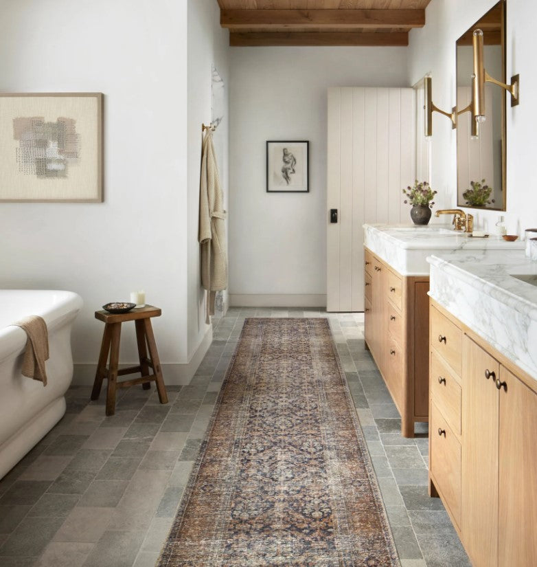 Amber Lewis Loloi Billie BIL-01 in Ink Salmon Vintage Area Rug styled in bathroom by Amber Interiors