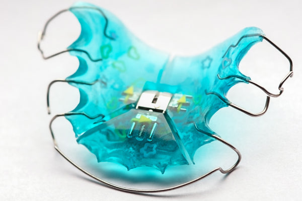 An image of a Hawley retainer on a white background