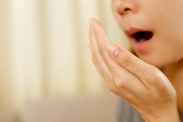 bad breath caused by swollen gums
